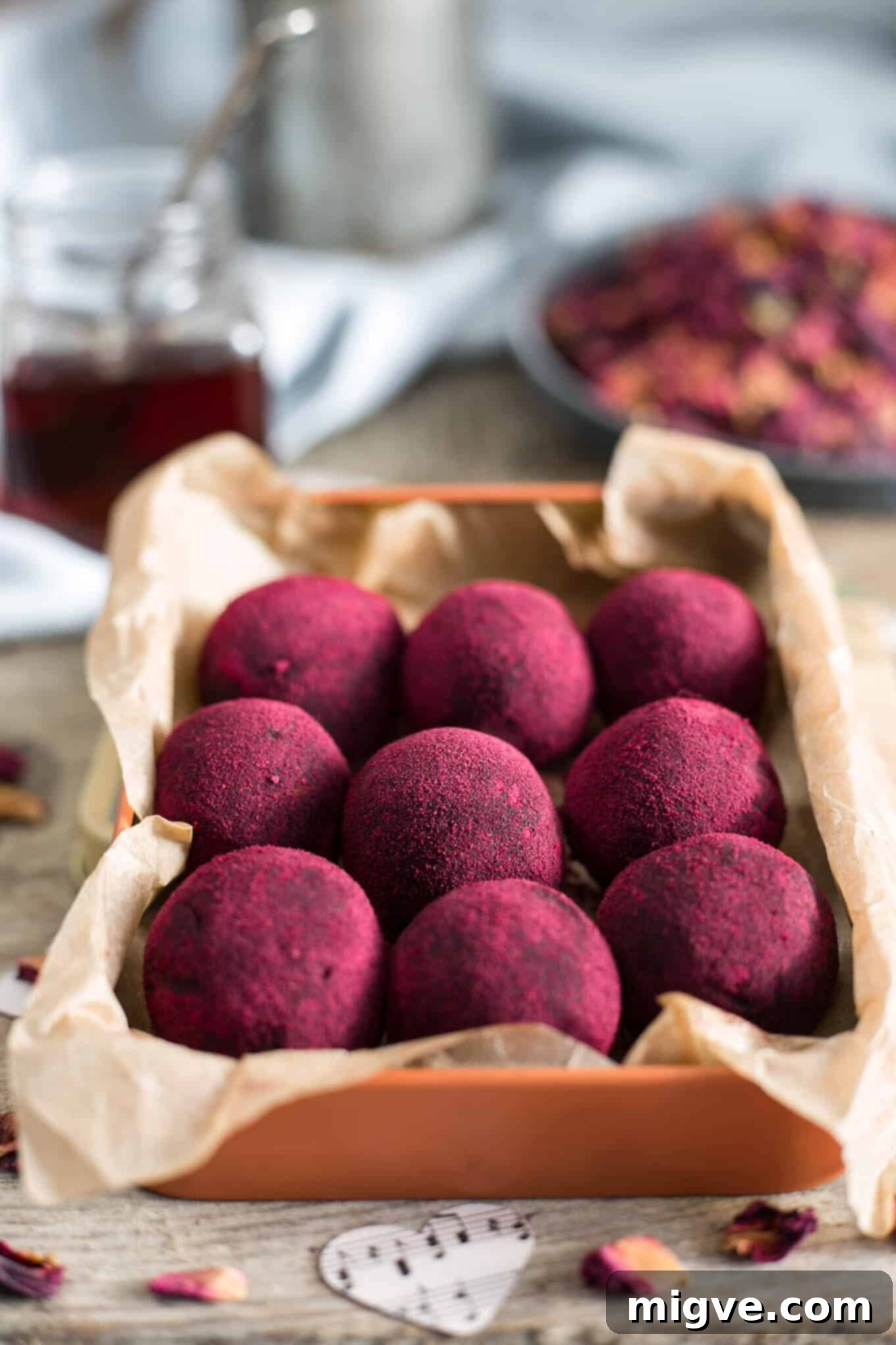 Healthy chocolate and peanut butter truffles made with natural ingredients. A vegan, refined sugar-free treat for any occasion, including Valentine's.