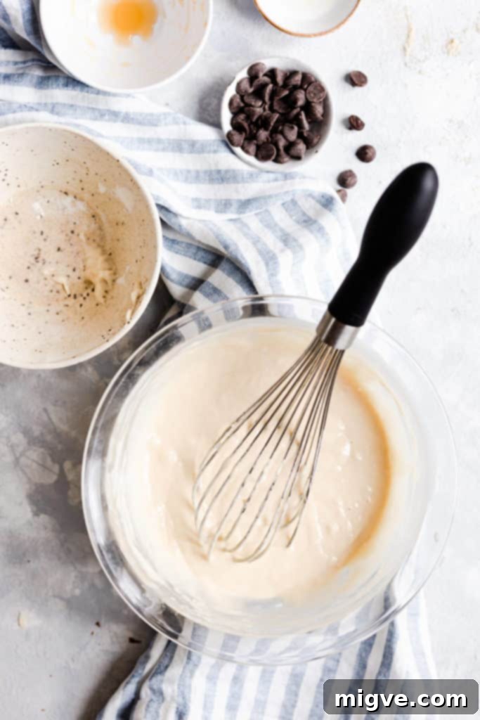Caramelized Banana Hazelnut Stack 8 Overhead shot of a bowl with perfectly mixed pancake batter, ready for cooking