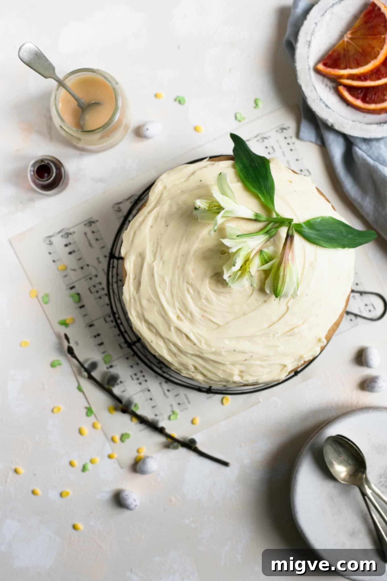 Beautiful vegan white chocolate and blood orange curd cake, a perfect centerpiece for Easter or any dairy-free celebration. #vegancake #dairyfree #Easter