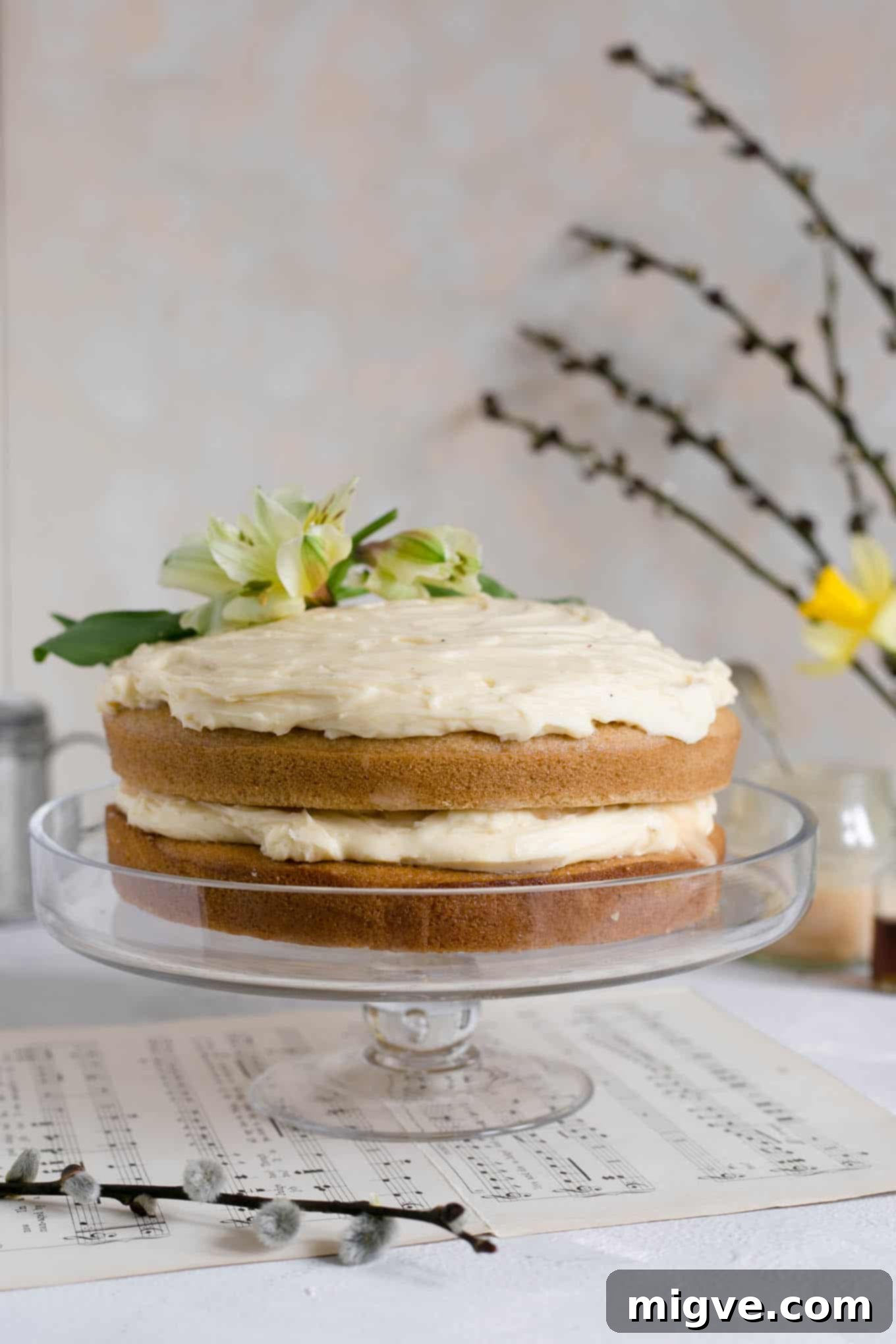 Stunning vegan white chocolate cake with blood orange curd, showcasing layers of creamy frosting and zesty filling. #dairyfree #vegan #cake