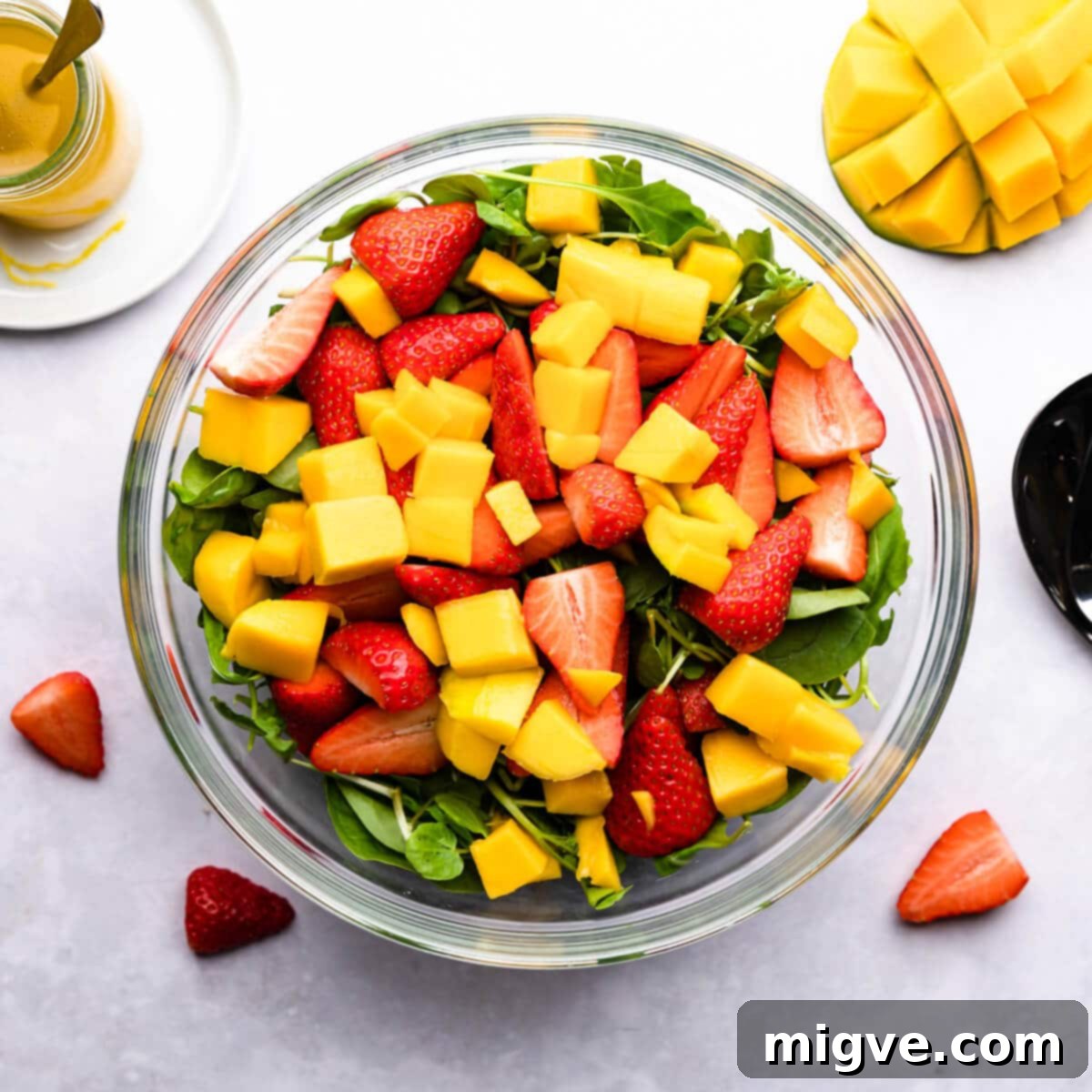 top view at glass bowl with salad ingredients