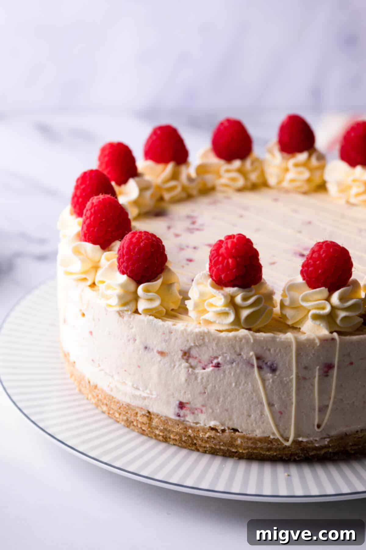 No bake cheesecake with raspberries and white chocolate.