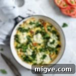 Mushroom and kale frittata with tomato and basil salad