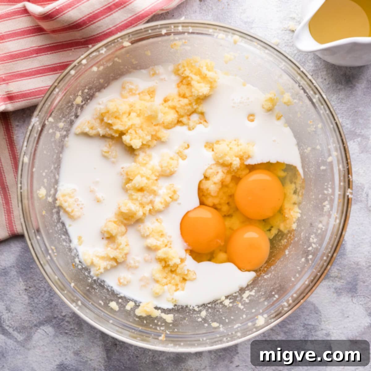 bowl with creamed butter, sugar, eggs and buttermilk.