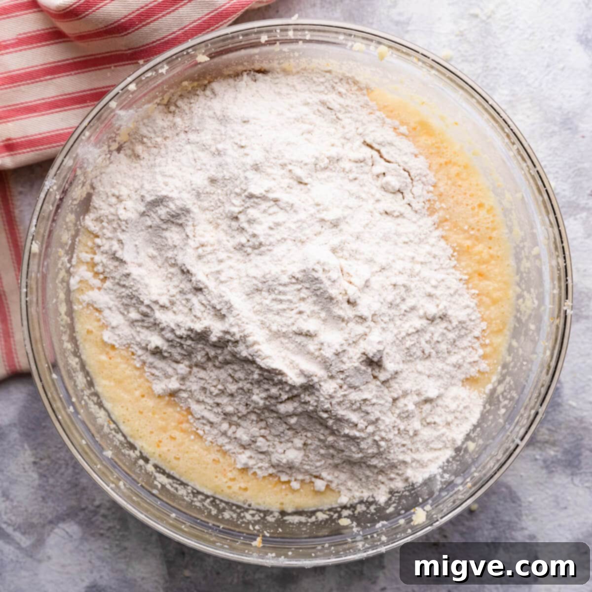 bowl with dry ingredients added on top of the wet ingredients.