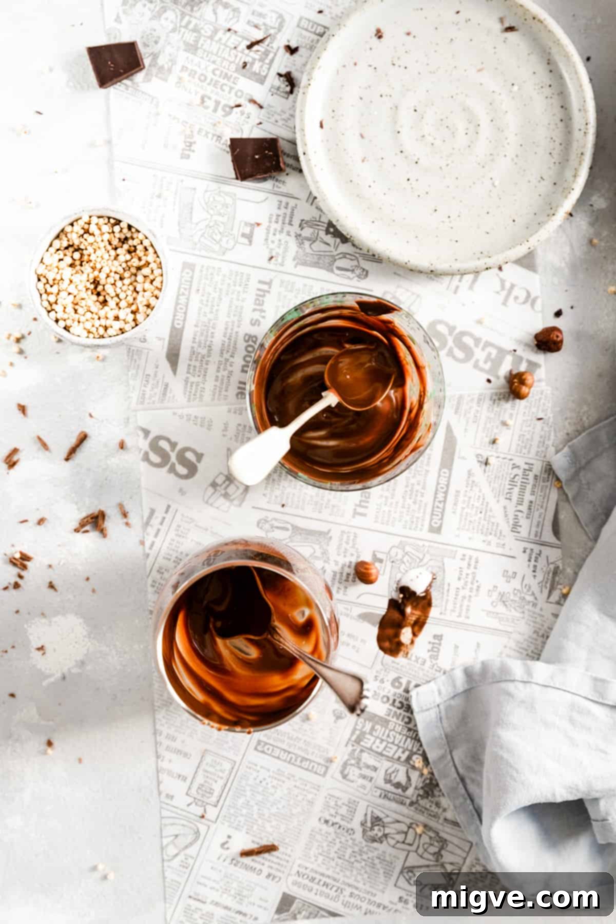 overhead shot of two empty glasses with remains of vegan chocolate pudding