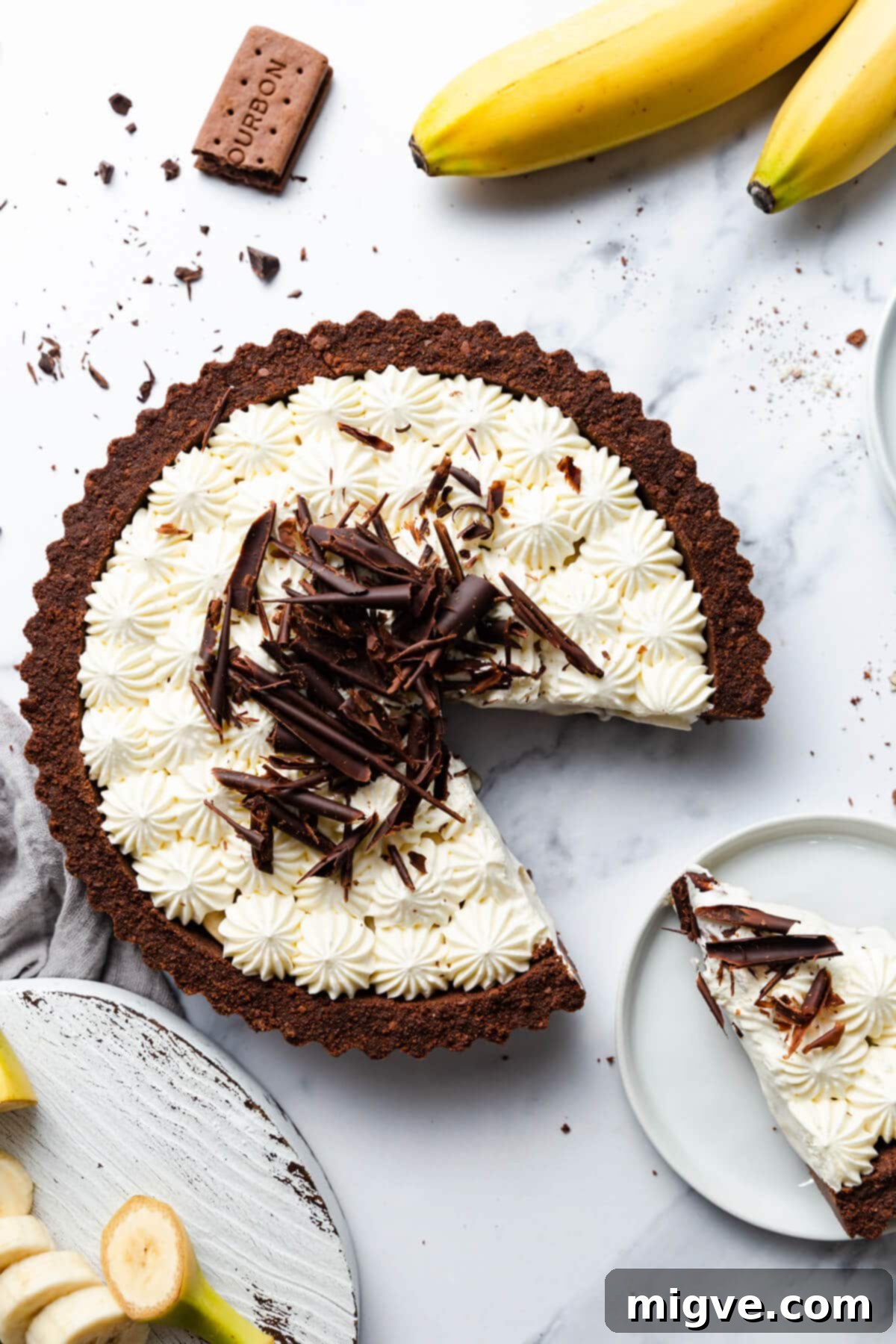 Overhead shot of the banoffee pie with one slice cut out