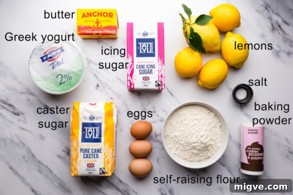 An overhead view of all the fresh ingredients laid out, ready to make a zesty lemon cake, with text labels for clarity.