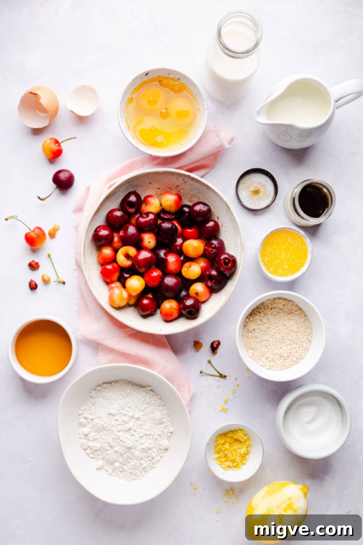 top view of bowls with ingredients for cherry clafoutis