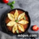 top view of a pan with stuffed pasta shells bake