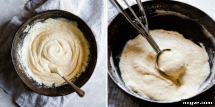 A close-up process shot of the smooth, thick pancake batter in a mixing bowl, ready for cooking.
