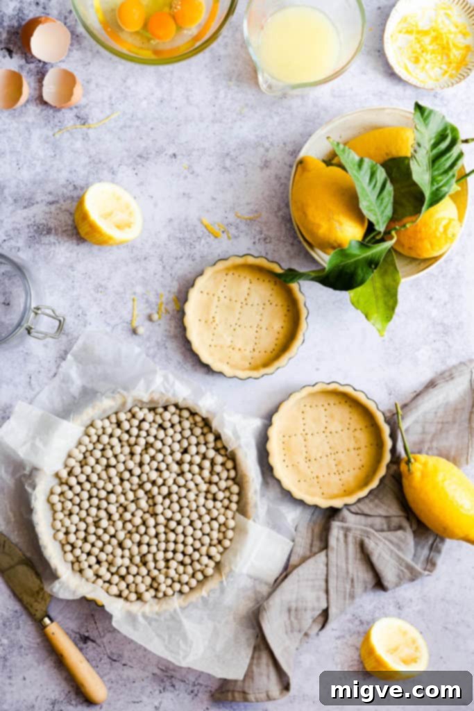 Unbaked pastry gently pressed into a tart tin, showing the excess being trimmed.