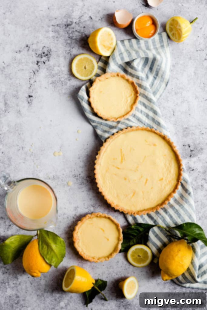 Egg whites being whisked to stiff peaks in an electric mixer bowl.