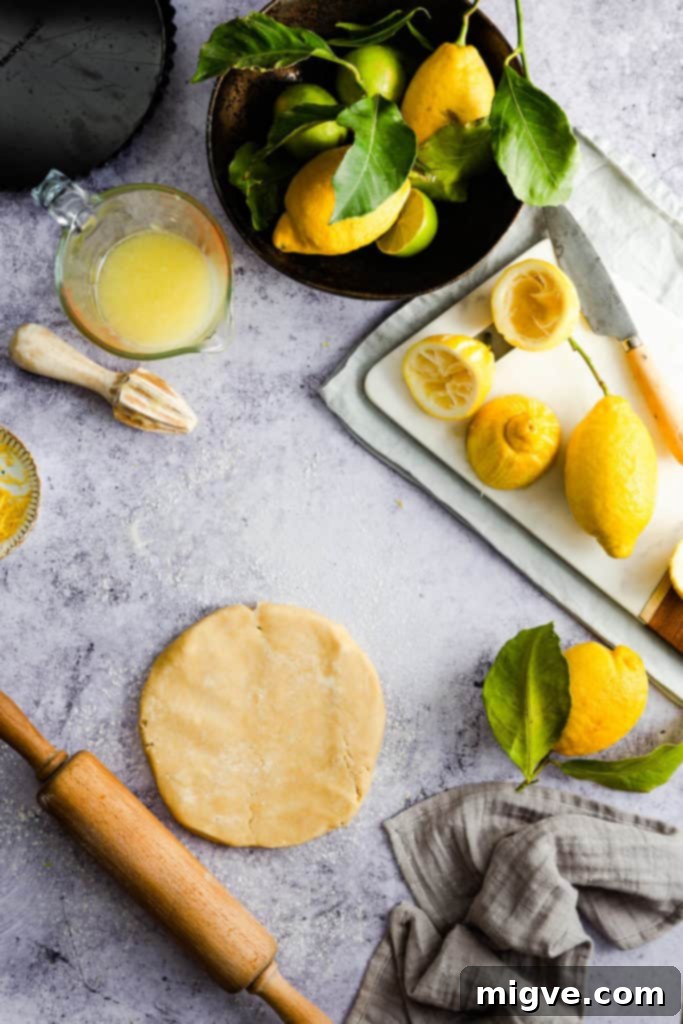 Dough being mixed in a bowl, showing initial preparation for the pastry crust.
