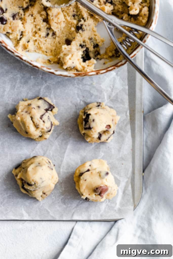 top view of raw cookie dough balls prepared on a baking tray using the stacking method