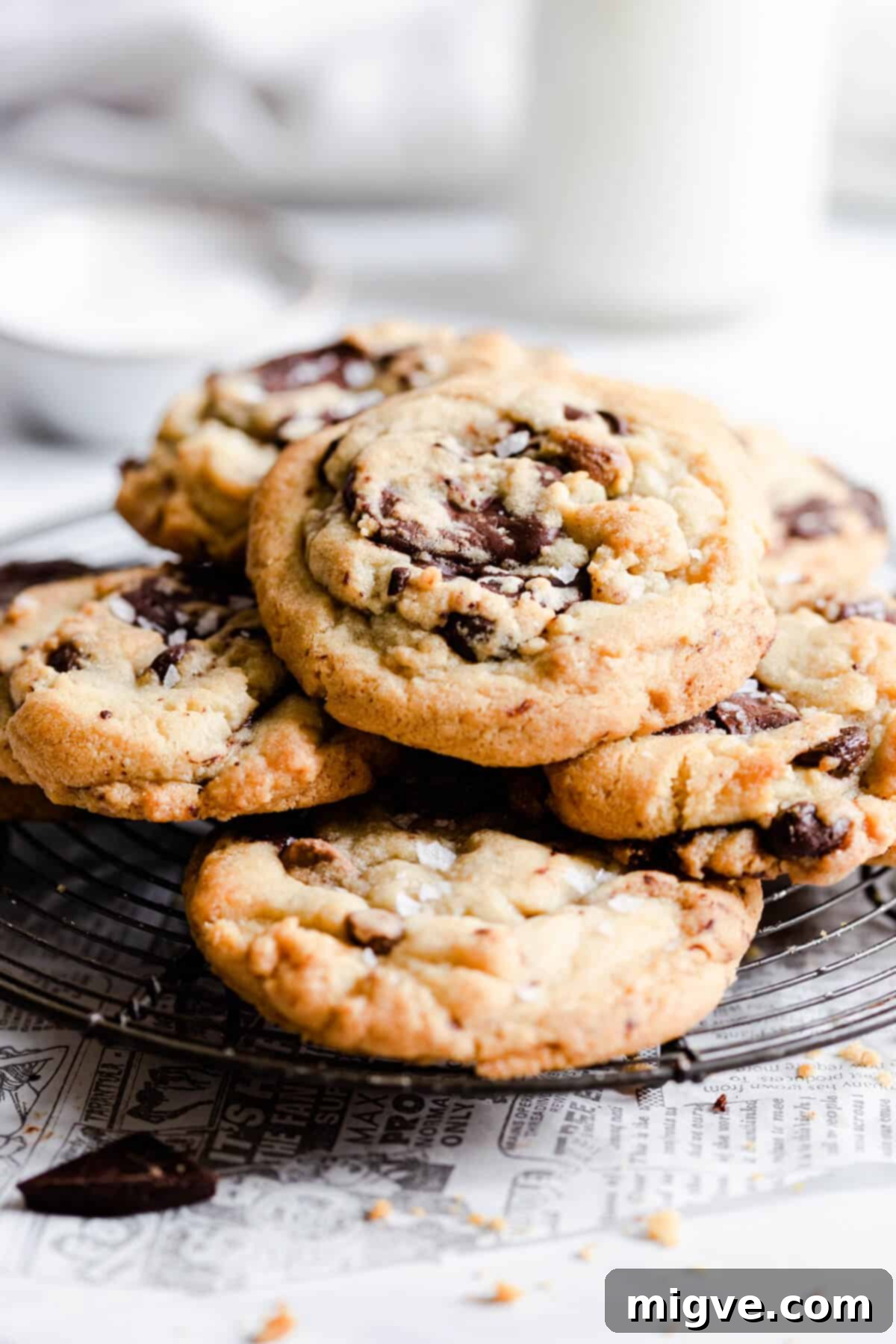 side view of chocolate cookies cooling on a wire rack, perfectly golden