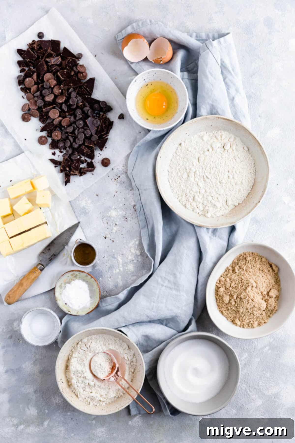top view of bowls with ingredients for cookies laid out aesthetically