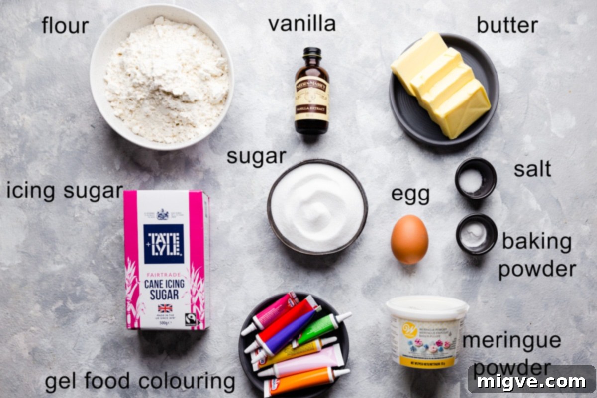 An overhead shot showcasing all the essential ingredients for sugar cookies and royal icing, neatly arranged with clear text labels for easy identification.