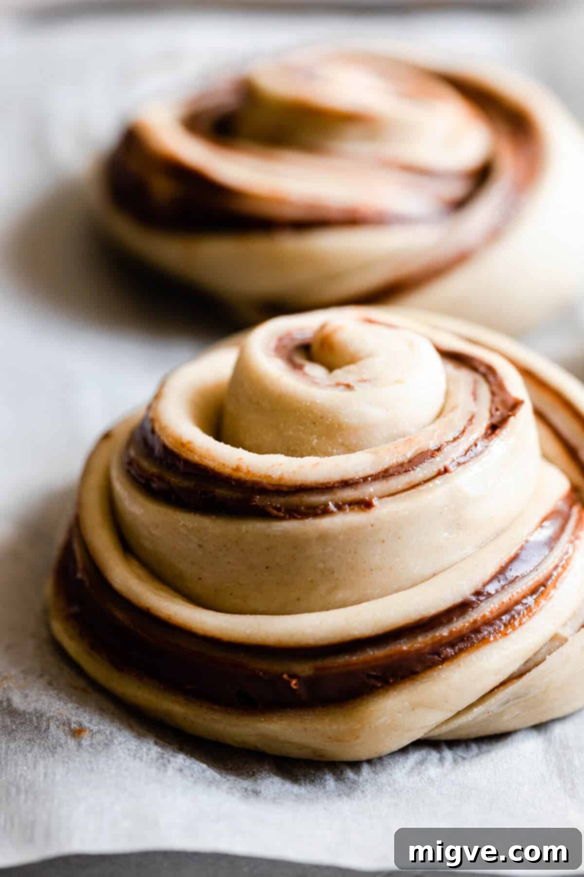 side angle super close up of hazelnut swirl bun