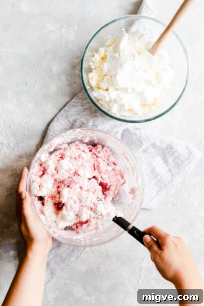 overhead shot showing meringue being folded into coconut