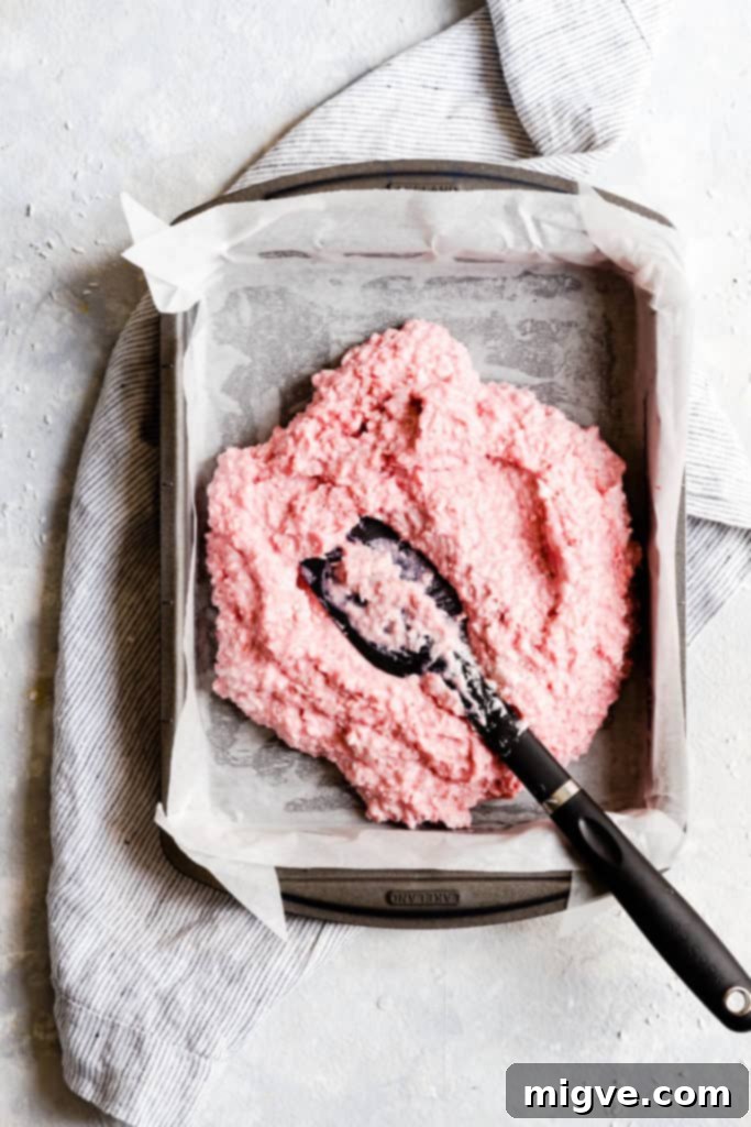 top view close up of baking tin with strawberry coconut mix