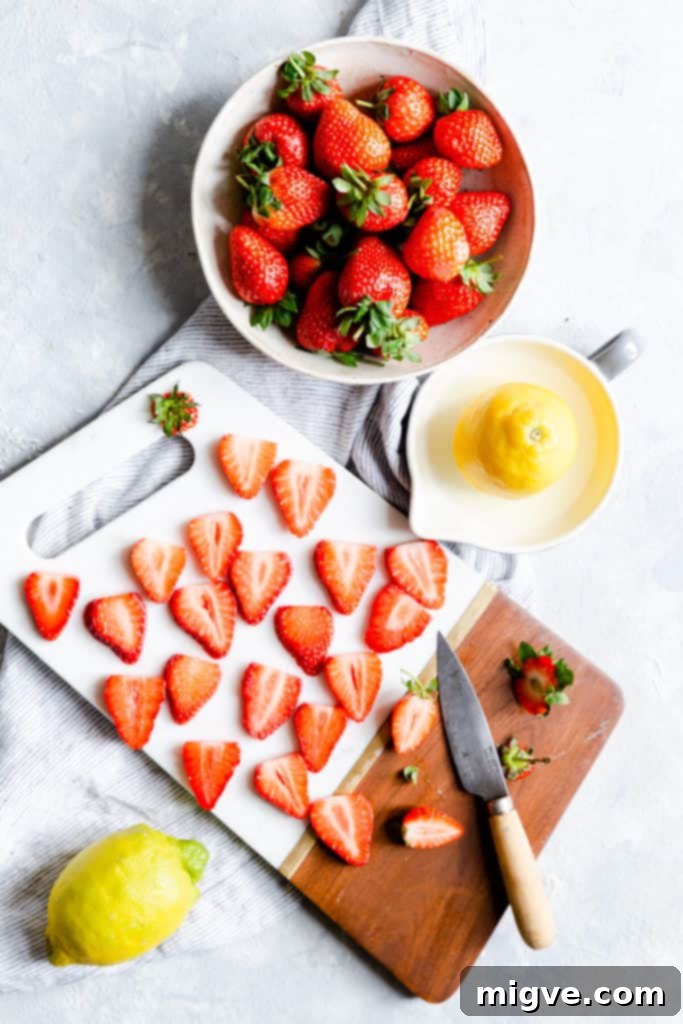 overhead view of fresh strawberries cut into slices