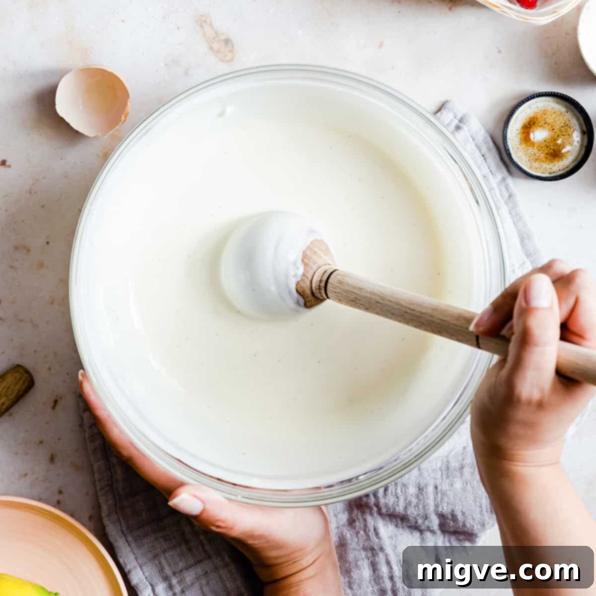 Velvet Raspberry Mascarpone Tart 5 mascarpone cream filling being mixed in a large bowl.