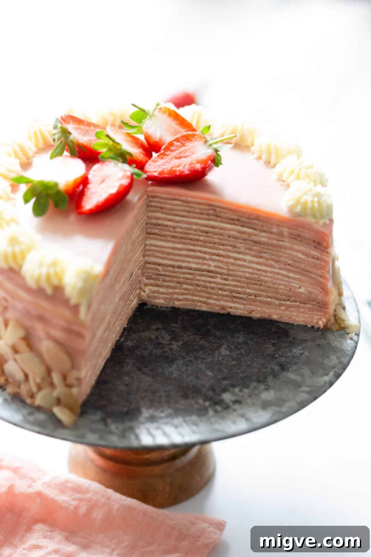 top side angle close up showing the layers inside of the crepe cake