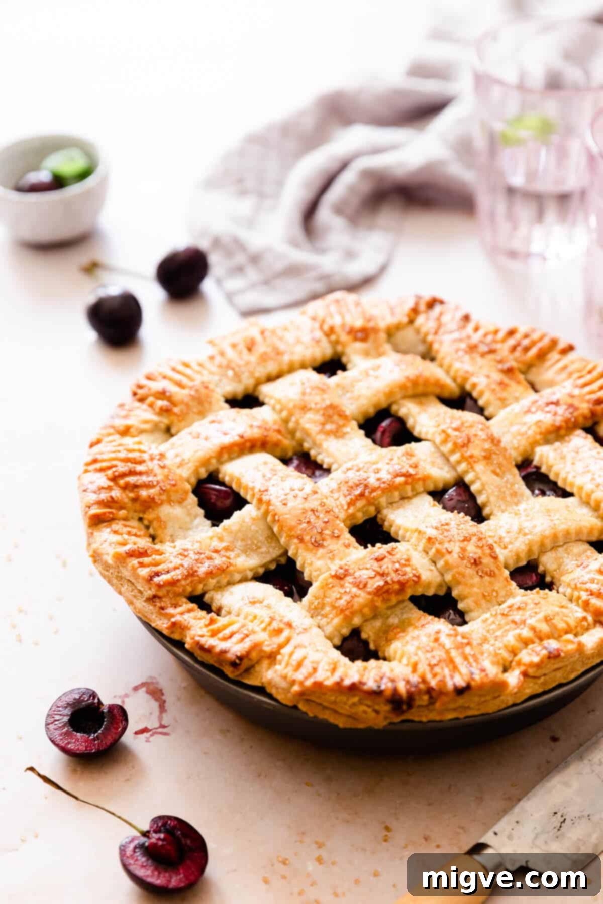side angle of homemade cherry pie in a baking dish