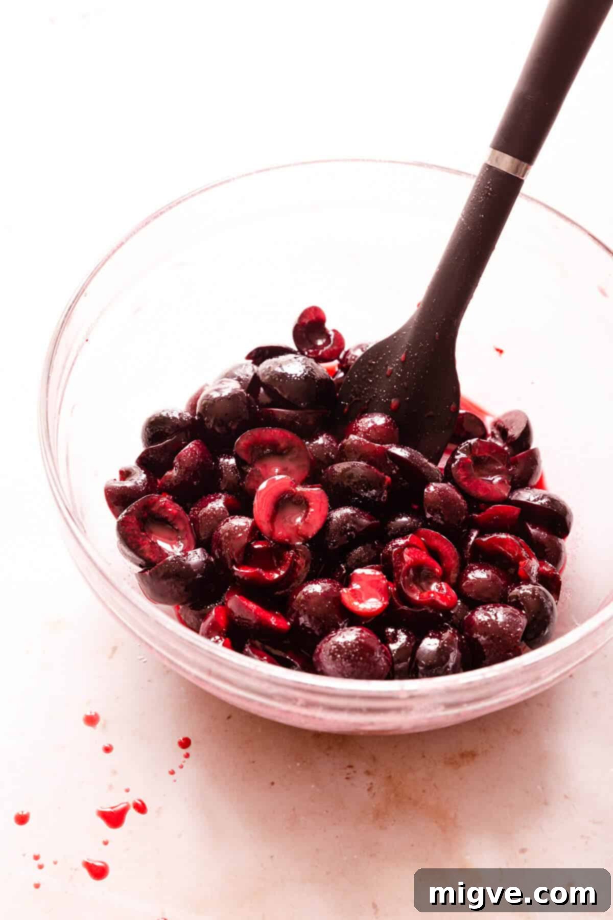 side close up of cherry filling in a glass bowl