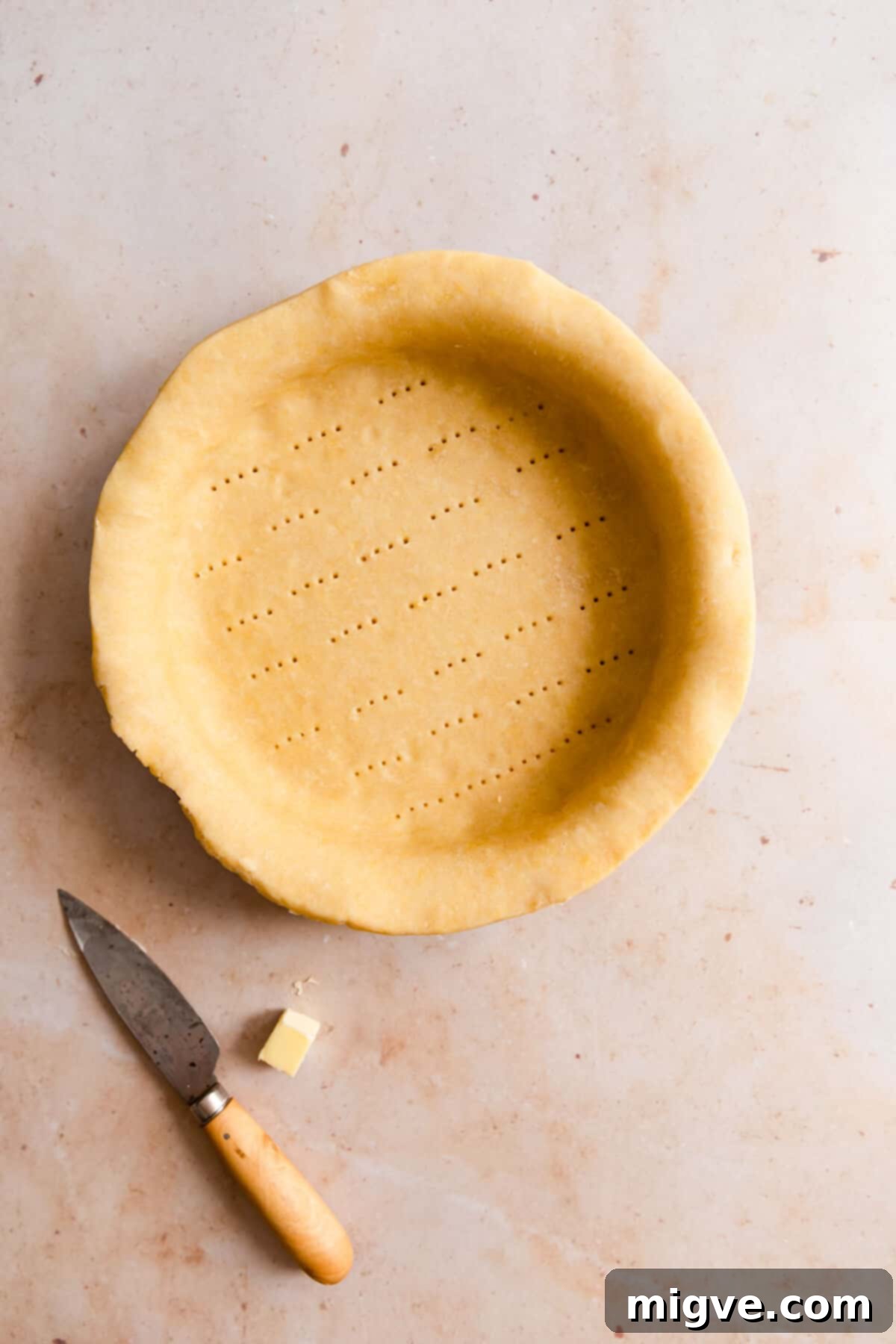 top view of unbaked pie pastry in a baking dish