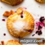 top view close up of spiced apple and blackberry hand pie sprinkled with caster sugar