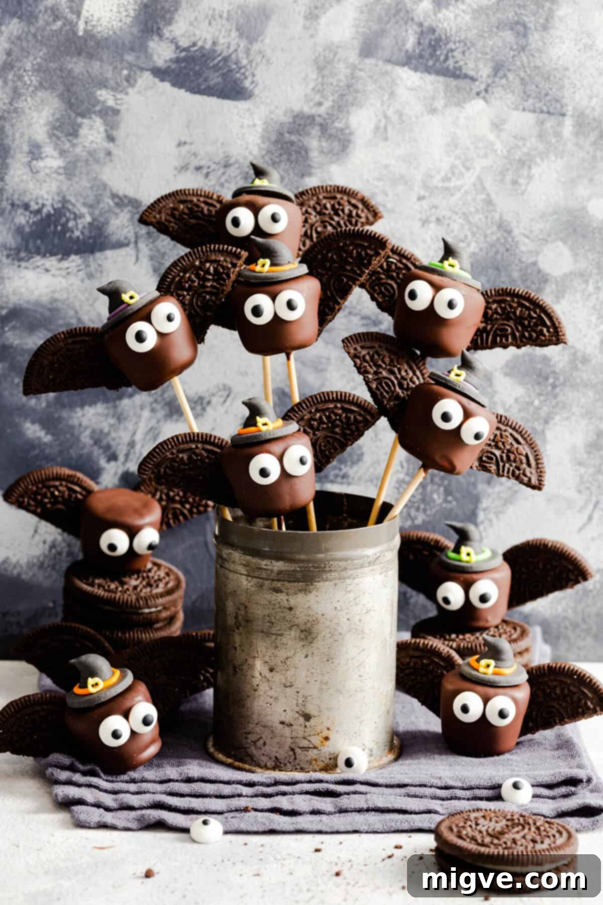 Midnight Marshmallow Bats 8 side shot of chocolate bats on bamboo skewers in a little cup