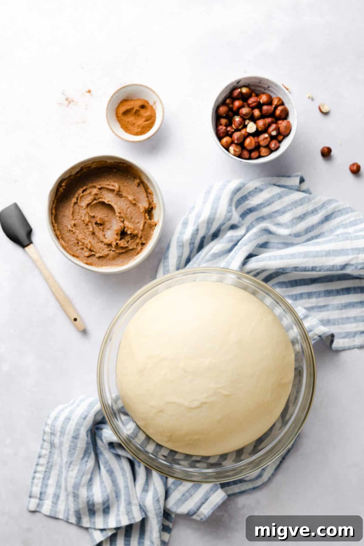 overhead shot of bowls with ingredients to make twisted cinnamon bread