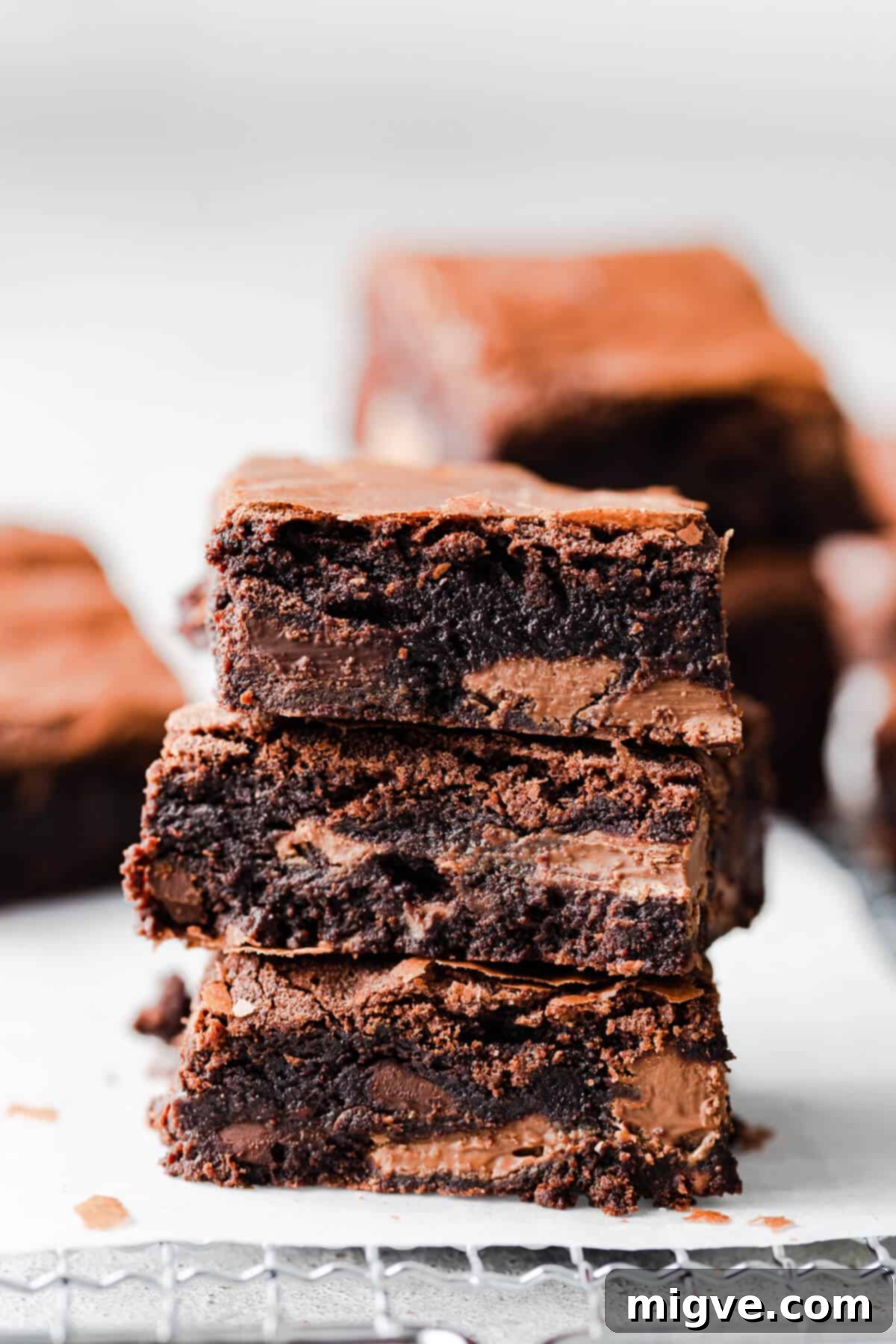 Foolproof Fudgy Brownies 6 side shot of a stack of three chocolate brownies