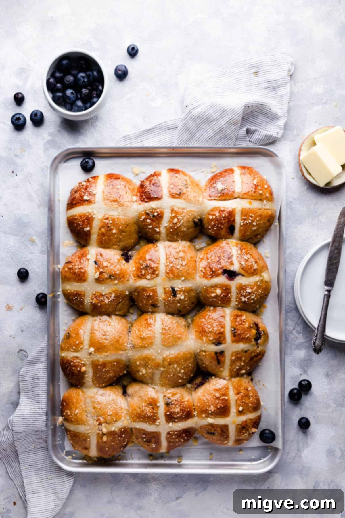 Luscious Blueberry Hot Cross Buns 2 top view at a baking tray with hot cross buns