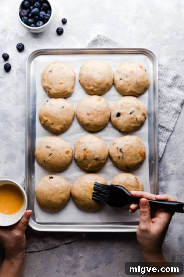 Luscious Blueberry Hot Cross Buns 9 top view of dough shaped into buns and brushed with eggwash