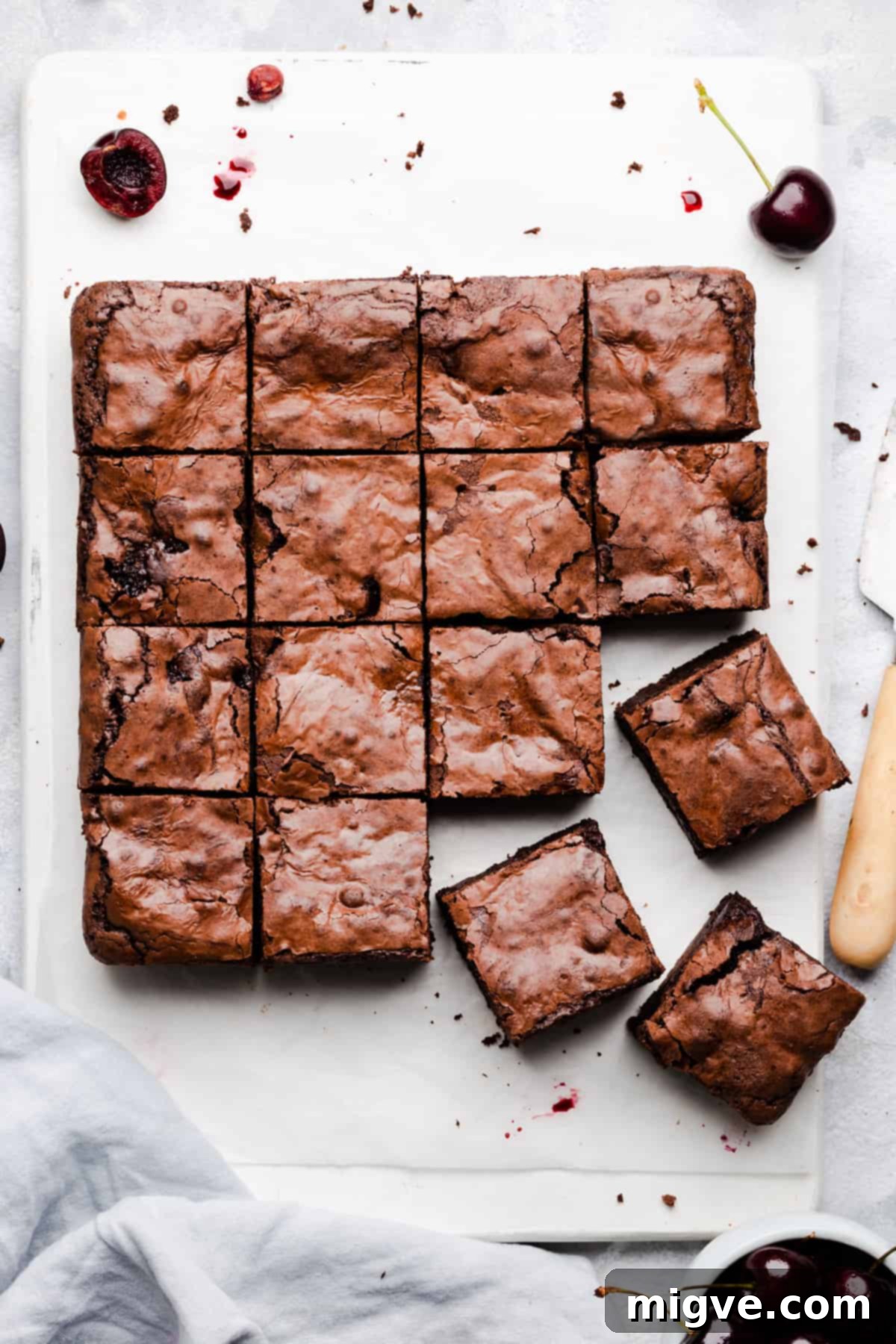 overhead shot of chocolate brownie sliced into 16 squares