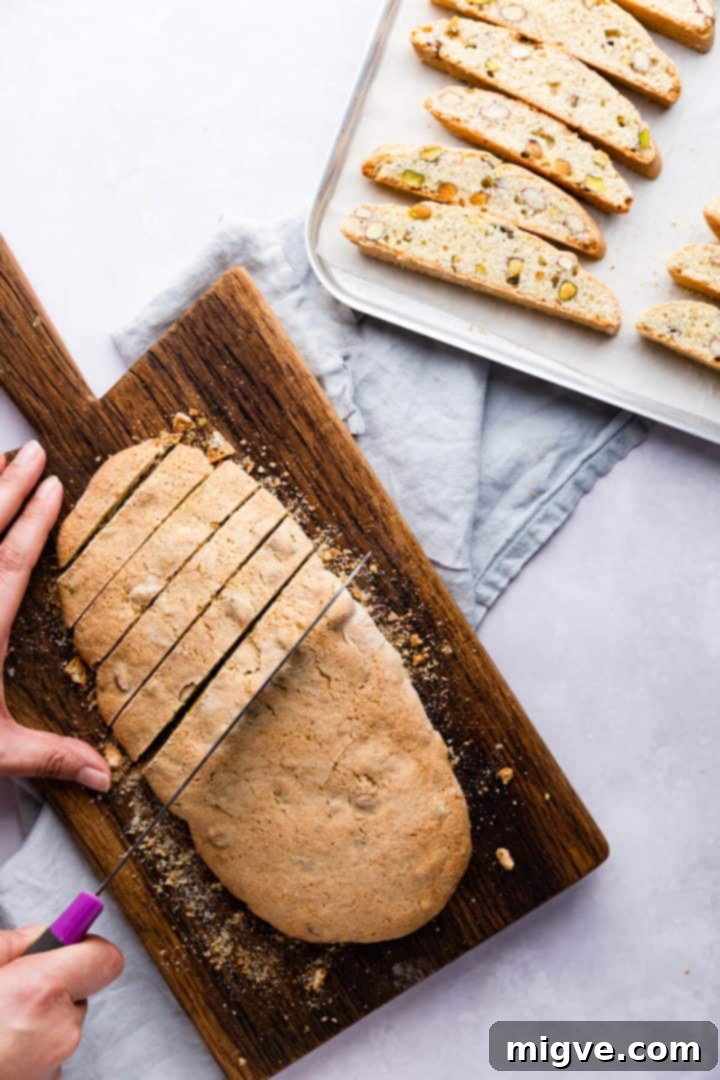 top view of biscotti dough log being sliced