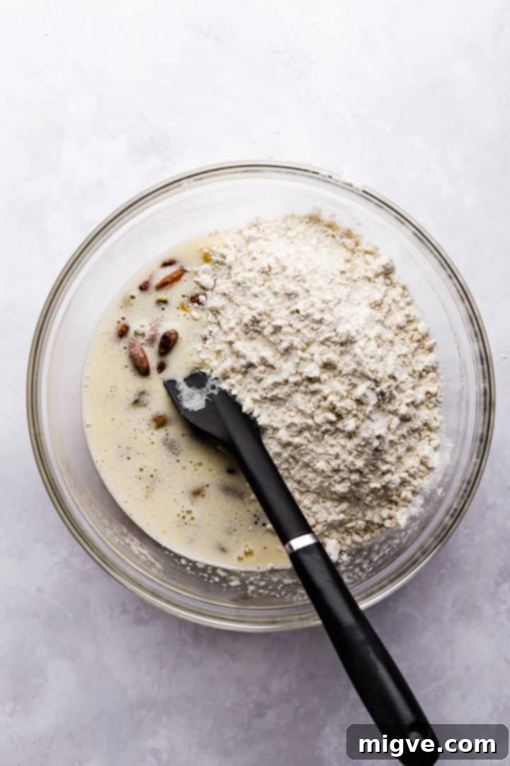 overhead shot of a bowl with wet and dry ingredients