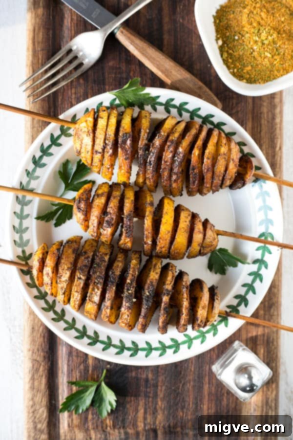 Golden Spiral Roasted Potatoes 2 Crispy Baked Tornado Potatoes with fragrant herbs and spices, a delicious vegan and dairy-free treat.