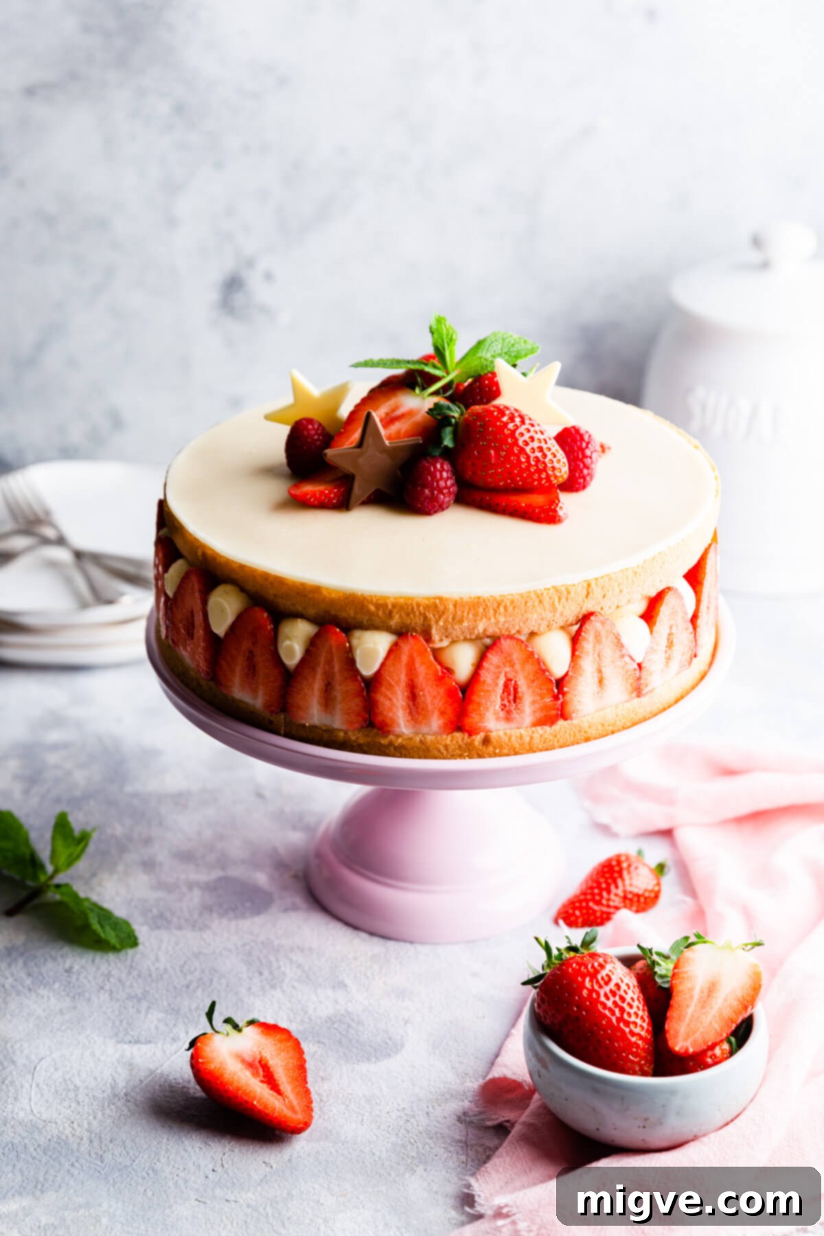 45 degree angle photo of fresh strawberry cake with creme mousseline