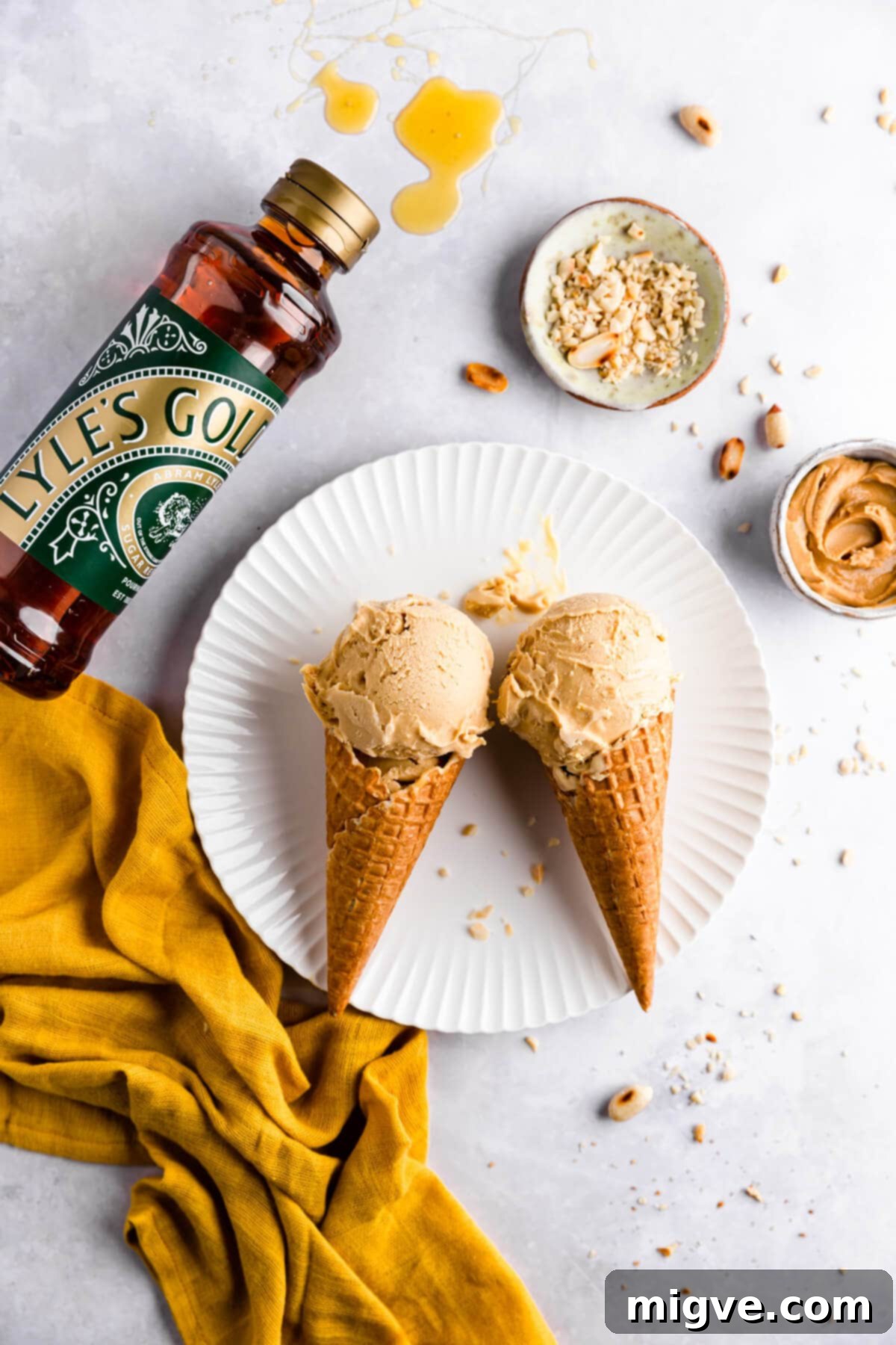 overhead view of two ice cream cones with scoops of ice cream