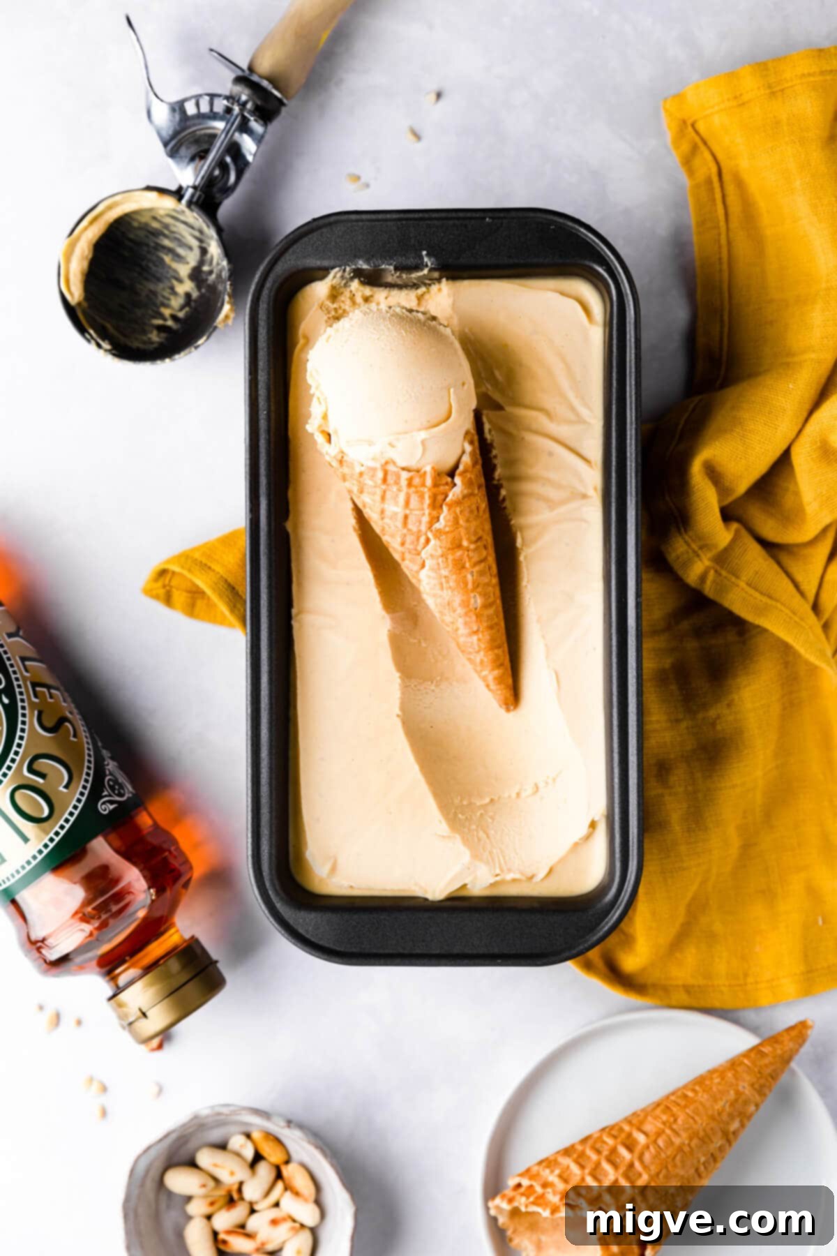top view of peanut butter ice cream with scoop inside of the cone