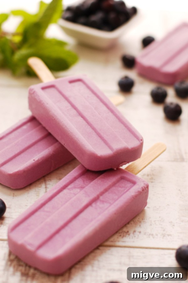 Blueberry and Purple Sweet Potato Popsicles - A vibrant and healthy summer treat.