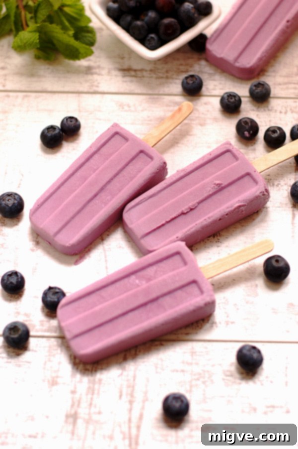 Awesome Purple Vegan Popsicles made with Blueberries and Purple Sweet Potato - A naturally sweet and colorful treat.