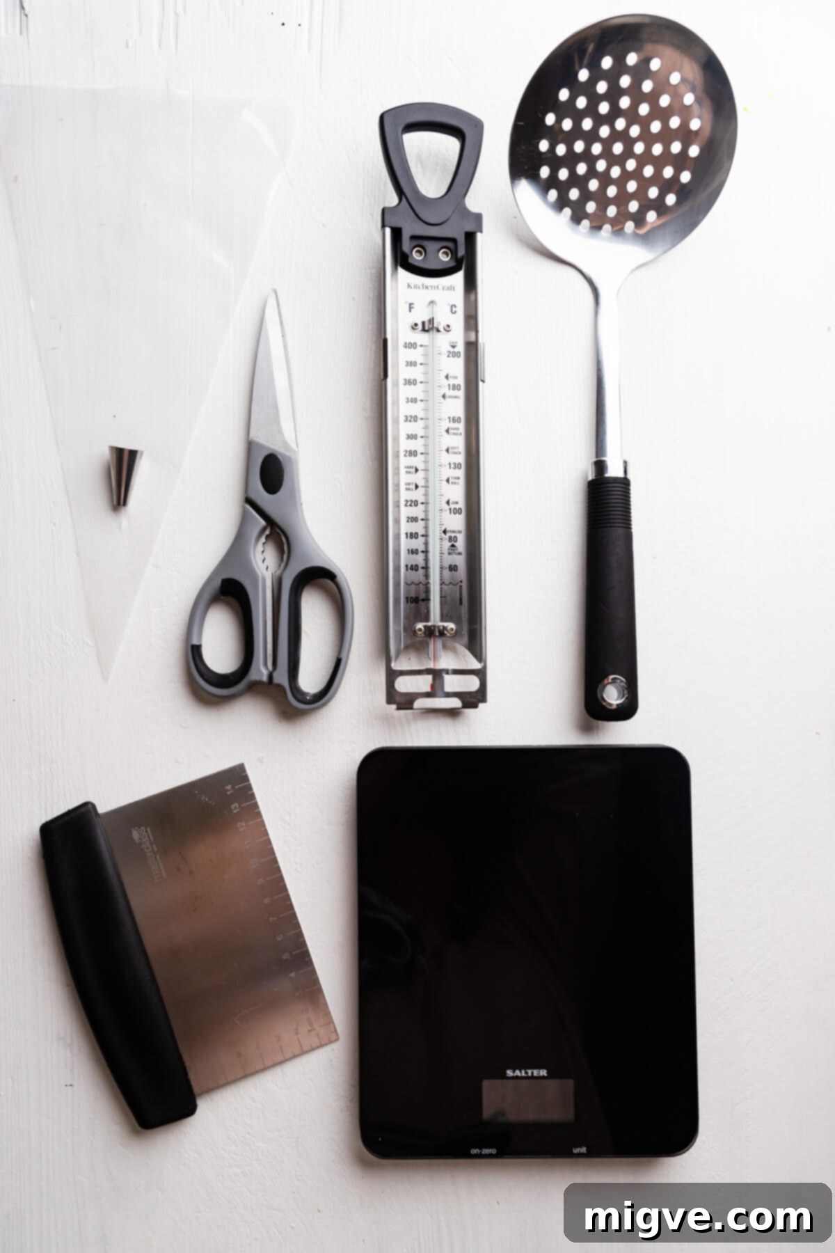 Spiced Pumpkin Doughnut Delights 12 top view of the kitchen utensils on a white board