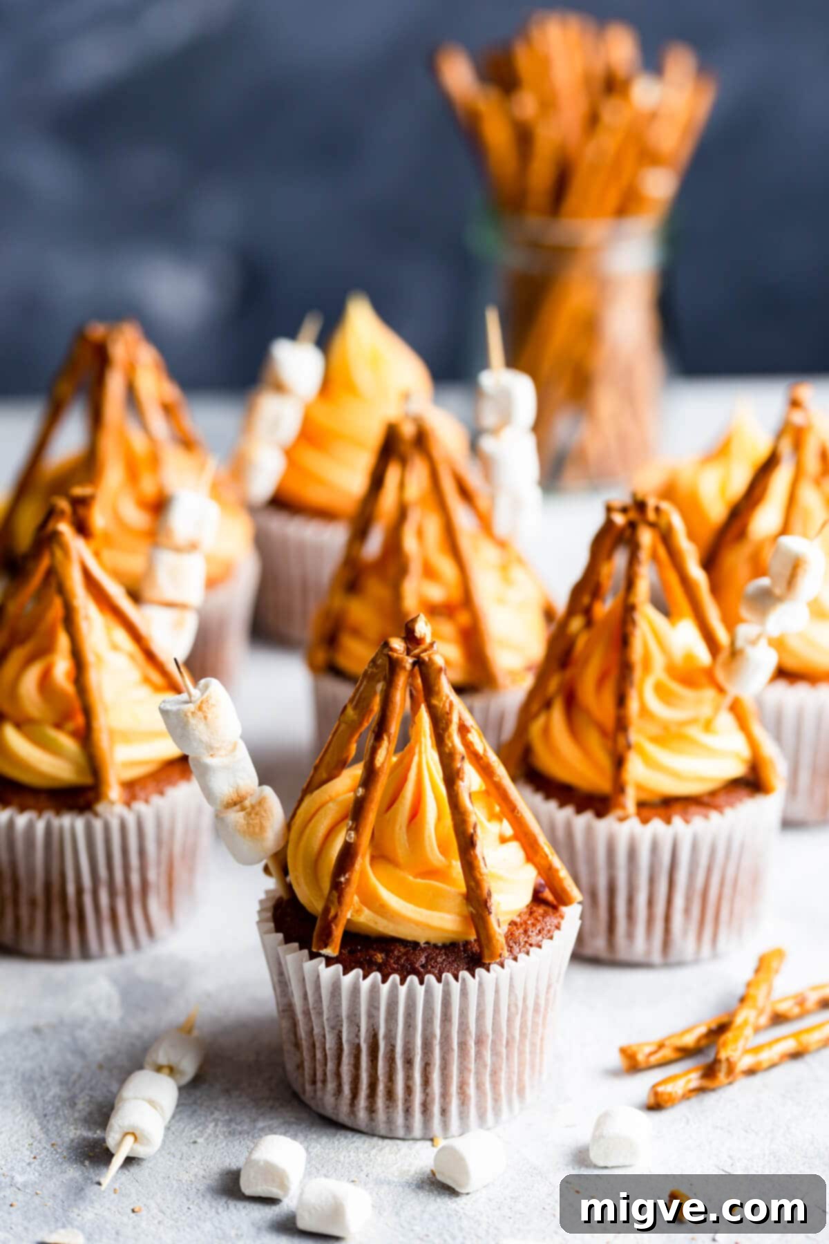 Flame-Kissed Cupcakes 11 45 degree angle close up at bonfire cupcake with mini marshmallows and pretzel sticks