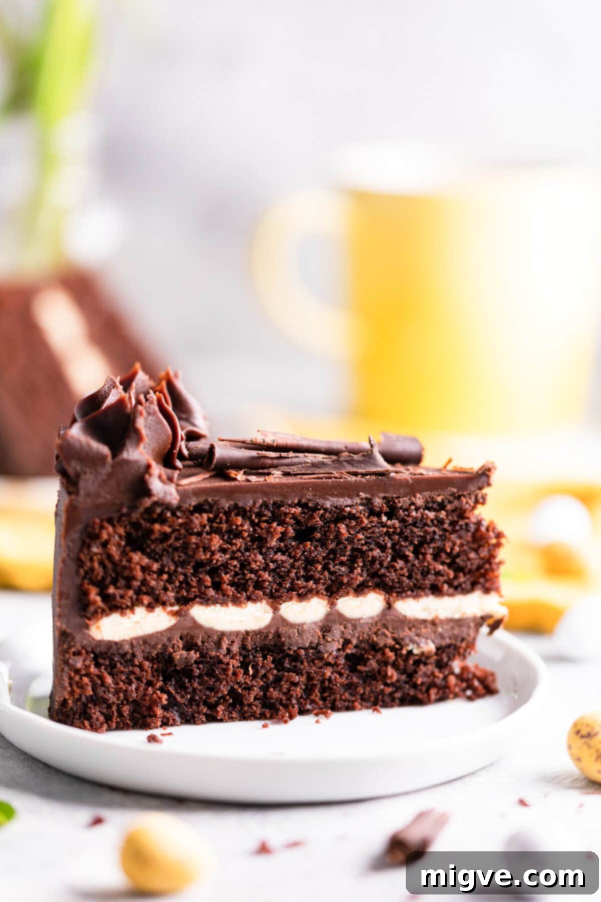 super close up at a slice of one bowl chocolate cake on a small plate