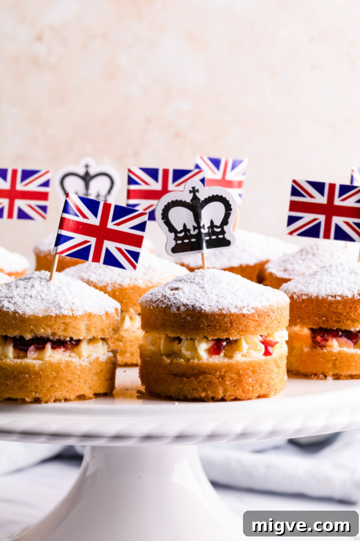 Classic Victoria Sponge 12 side close up of mini Victoria sponge cakes on a cake stand